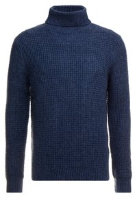 Marinblå polotröja med ett strukturerat våffelstickat mönster, ribbade muddar och fåll. Tillverkad av ett mjukt, varmt tyg.