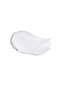 Weiße Creme-Probe mit glatter und glänzender Textur und einer dicke Konsistenz. Die Oberfläche scheint leicht reflektierend.