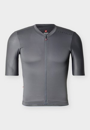 Cyklistický dres s krátkym rukávom v sivej farbe, predným zipsom, jemnou vertikálnou textúrou a logom „Castelli“ na pravom ramene a golieri.