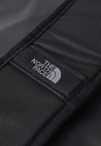 The North Face BASE CAMP DUFFEL - XS - Ranac - indigo plum-bright foam-papaya