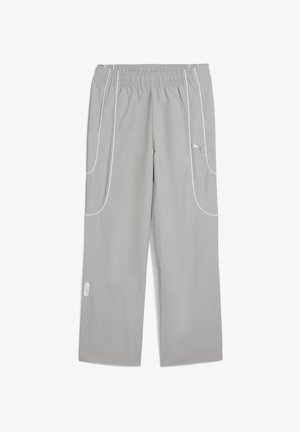Light gray elastic waist track pants with white piping details and Puma logo on upper thigh, loose fit and straight legs.