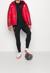 Nike Performance Jogginghose - black