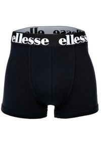 Mustat puuvillaboksershortsit pehmeällä, joustavalla vyötäröillä, joissa on valkoinen "ellesse" -brändäys. Kangas on sileä ja istuva muotoilu.