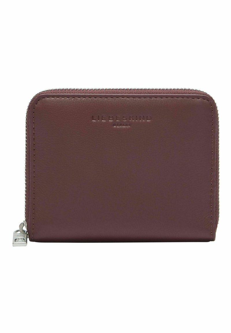 Portfel ze skóry w kolorze bordowym z zamkiem błyskawicznym dookoła, na przedniej stronie tłoczone logo marki i srebrne wykończenie. Gładka faktura.