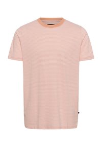 Striped t-shirt in light peach with short sleeves and a round neckline. Features thin white horizontal stripes and a tag at the hem.