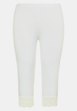 Weiße Capri-Leggings aus weicher Baumwolle, mit einer Spitzenakzent am Saum. Elastischer Bund für Komfort und eine figurbetonte Silhouette.