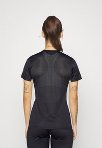 Nike Performance TOP BRANDED - Spordi T-särk - black/white