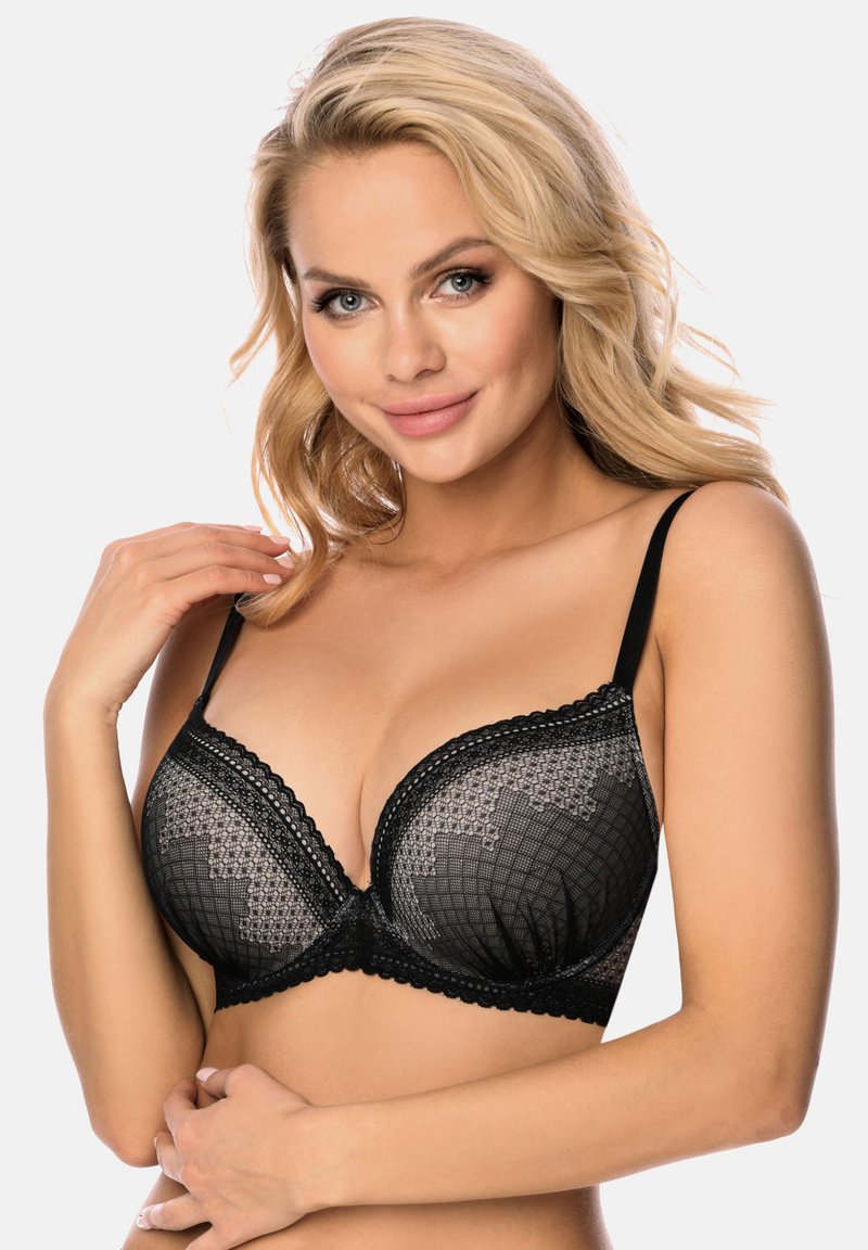 Zwarte kanten bh met beugel, met een gelaagd geometrisch patroon en geschulpte rand langs de randen, verstelbare bandjes en zachte cups.