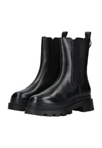 Botas Chelsea de cuero negro con paneles laterales elásticos, puntera redonda y suela de goma gruesa con un profundo dibujo para mayor tracción.