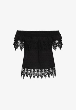 Must mustriga õlgadelt avatud must tops, millel on tekstureeritud kangas ja täpid ning keeruline pitsäär. Pehme ja kerge materjal.