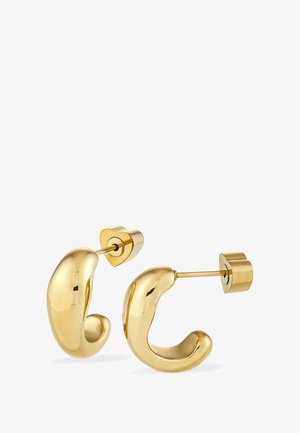 Pair of polished gold hoop earrings with heart-shaped backings on white background.