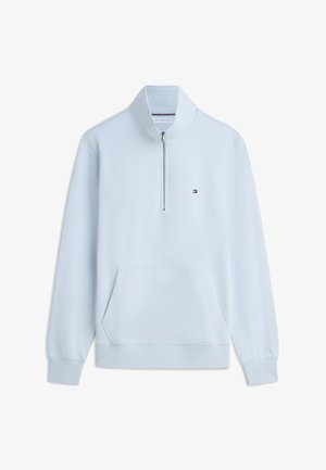 Felpa azzurro chiaro con mezza cerniera, tasca a marsupio, polsini e orlo a coste, e piccolo logo Tommy Hilfiger sul petto.