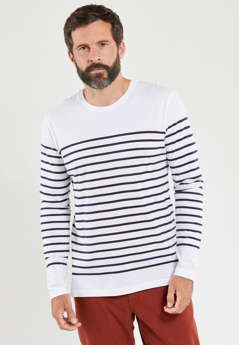 Langærmet t-shirt lavet af bomuld, med vandrette navy-striber på en hvid baggrund, rund halsudskæring og tætsiddende ærmer.