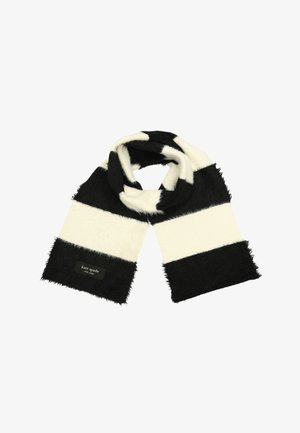 Fular cu dungi alb-negru, fabricat dintr-un material moale și pufoasă. Are o etichetă neagră cu textul "kate spade" la un capăt.