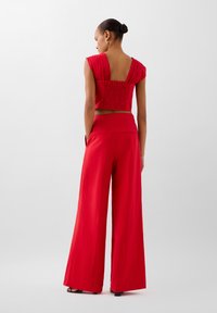 Scalpers DRAPPED - Stoffhose - red