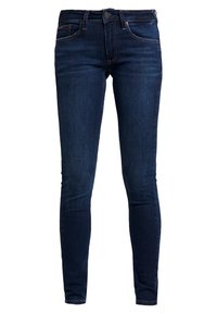 Tajta jeans i mörkblå denim, med femfickorsdesign, dragkedja och kontrasterande sömmar. Slät textur med lätt stretch.