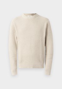 Maglione cremoso strutturato con scollo e polsini a costine. Presenta un motivo a griglia su tutta la superficie. Adatto per essere indossato a strati.