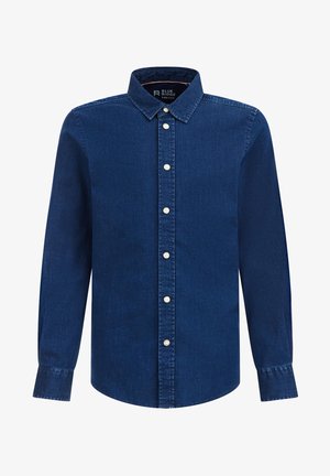 Chemise en denim bleu foncé à manches longues, boutons blancs, col pointu et poignets boutonnés, présentée de face sur fond uni.