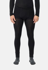 Schwarze Thermoleggings aus einem weichen, dehnbaren Material. Sie verfügen über ein figurbetontes Design mit einem elastischen Bund und einer glatten Textur.