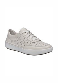 White leather sneaker featuring perforated design on the sides, round toe, lace-up closure, and textured rubber sole.