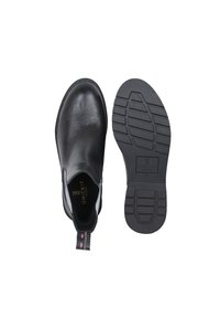 Czarne skórzane botki za kostkę z okrągłym noskiem, elastycznymi bocznymi panelami, teksturowaną gumową podeszwą oraz uchwytem z kolorowymi kropkami z tyłu.