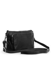 Sac en cuir noir à bandoulière avec poches zippées à l'avant et à l'arrière, sangle réglable, texture lisse et design minimaliste.