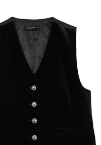 Gilet in velluto nero con scollo a V, cinque bottoni argentati lucidi e due tasche frontali. L'etichetta riporta "CALLIOPE", taglia S. Texture liscia.