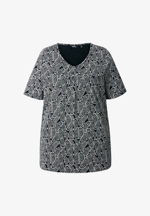 Blusa nera a maniche corte con motivo paisley bianco. Design a V e vestibilità rilassata con una texture morbida in tutta la parte.