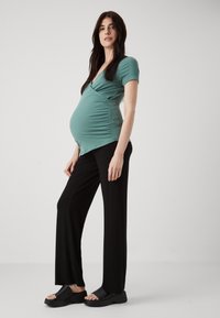 ONLY MATERNITY OLMLIMALA WIDE - Püksid - black