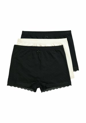 Trzy damskie krótkie spodenki bawełniane w kolorze czarnym, białym oraz czarnym w białe kropki, każdy z małą kokardką i koronkową lamówką na dole.