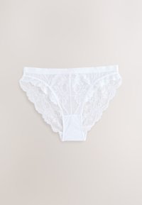 Baltos nėrinės kelnaitės su sudėtingais gėlių raštais ir lygiu priekiu. Kraštai yra banguoti, kad suteiktų daugiau detalių. Minkšta audinio tekstūra.