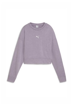 Felpa crop lilla realizzata in tessuto morbido. Presenta maniche lunghe, un colletto rotondo e un piccolo logo bianco Puma sul petto.