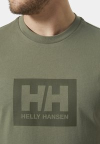 Helly Hansen HH BOX - Triko s potiskem - lav green