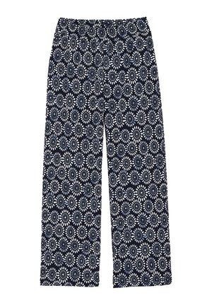 Pantalon bleu marine ample avec motif floral blanc, ceinture élastique, jambes larges, adapté à un port décontracté.