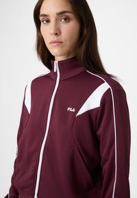 Fila RIVOLI REGULAR  - Verryttelytakki - fig-bright white