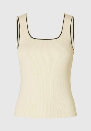 Kergete särk helesažikaga ja ruudukujulise kaelusega. Kaunistatud musta kontrastõmblusega kaela- ja käeaukude ümber.