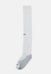 Nike knæhøje sokker i hvid bomuldsblanding; har en grå stribet hæl og tå samt sort logodetalje på skaftet.