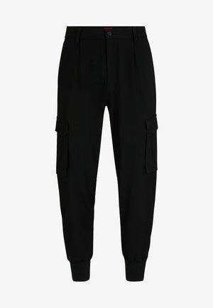 Schwarze Cargo-Hose mit zwei Seitentaschen, maßgeschneidertem Design, elastischen Bündchen und Knopfverschluss. Hergestellt aus einem glatten, gewebten Stoff.