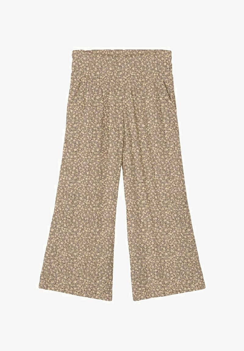 Pantalon beige à jambes larges avec un petit motif floral blanc et une ceinture élastique.