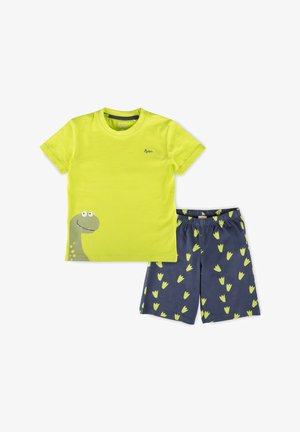 Helles grünes Kurzarmhemd mit fröhlichem Dinosaurier-Logo, kombiniert mit marineblauen Shorts, die mit grünen Dinosaurier-Fußabdrücken gemustert sind.