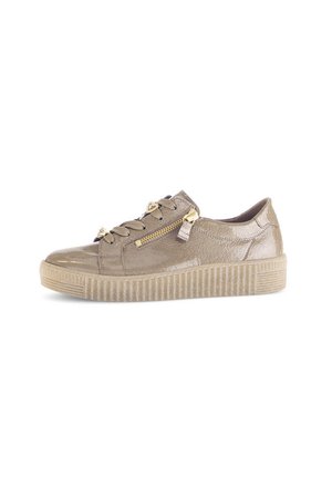 Brown leather sneaker with thick rubber sole, lace-up front, and decorative gold zipper on side.