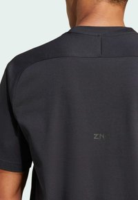 adidas Performance ADIDAS PERFORMANCE ALL BLACKS Z.N.E. TEE - T-shirts print - all black