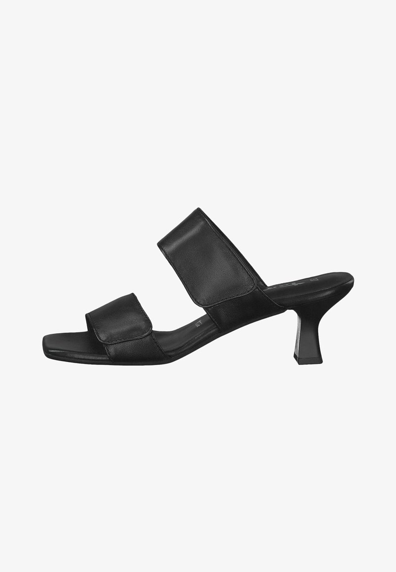 Black leather slide sandal with dual wide straps, open toe, square footbed, and a short, block heel. Smooth texture and minimalist design.