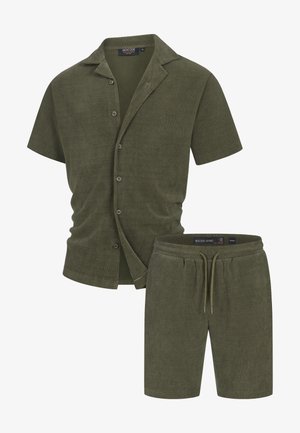 Olive green short-sleeve button-up shirt and matching shorts in ribbed texture. Features a collar, five buttons, and an elastic waistband.