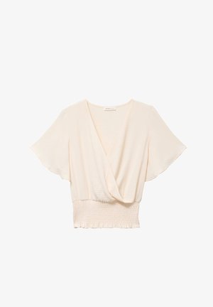 Crèmekleurige korte mouwen blouse met V-hals overslag en brede geplooide tailleband.