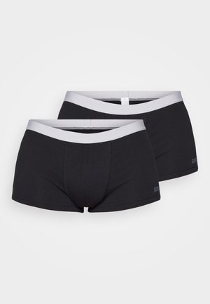 Boxer-briefs noirs en tissu doux, avec une ceinture élastique grise contrastante et une coupe ajustée avec des coutures minimales.
