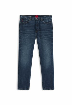 Dark blue denim jeans with a straight leg, featuring faded areas, five-pocket design, and a red logo tag on the waistband.