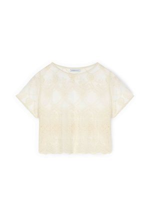 Crop top in pizzo color avorio a maniche corte con motivi floreali e orlo smerlato, con scollatura tonda.