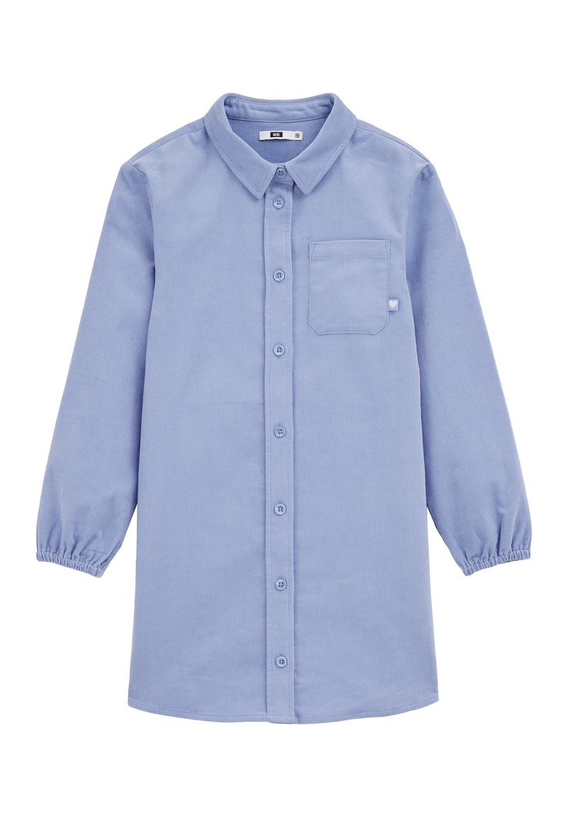 Camicia azzurro chiaro a maniche lunghe in tessuto di corduroy. Presenta una chiusura con bottoni sul davanti, colletto arrotondato e tasca a toppa sul lato sinistro del petto.