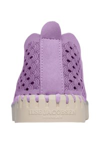 Lavender suede shoe with decorative cutouts, rounded tongue, and beige rubber sole featuring a textured bottom and brand logo.